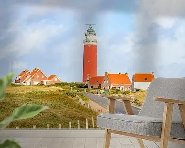 Vuurtoren van Texel in de duinen tijdens een stormachtige herfstochtend Bezpieczna płatność