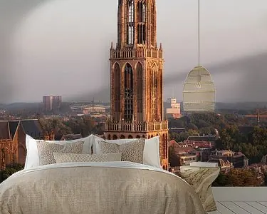 Wyprzedaż Utrechtse Domtoren in het strijklicht van de vroege avond vastgelegd vanaf de Neudeflat.