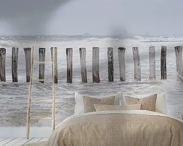 Golfbrekers in de zee en op het strand van Cadzand Zamów teraz