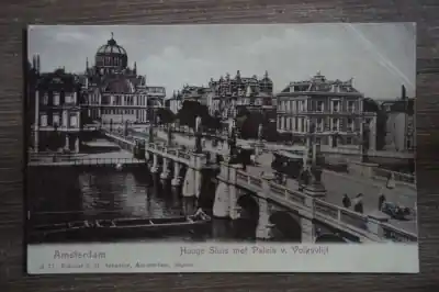 Amsterdam Hooge sluis met Paleis van Volksvlijf Tani